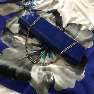 beautiful blue aldo bag and silver pendant